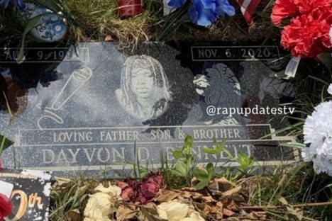 Candy bars, flowers, and other memorabilia commemorating the life of rapper King Von.
